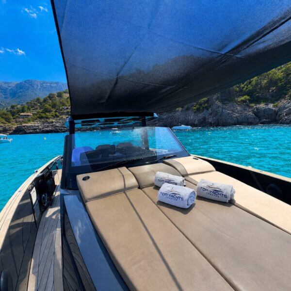 BLACK SHEEP – Fjord 42 Open 12 Shaded bow sun lounge beneath the Bimini on BLACK SHEEP